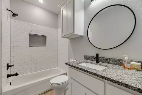 Bath - 718 E Crawford St, Denison, TX 75021 photo 1 of 4