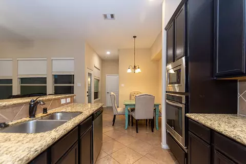Kitchen - 9158 Sunlight Oak Ln, Houston, TX 77070 photo 2 of 5