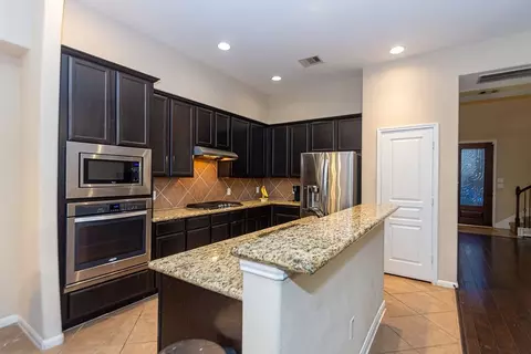 Kitchen - 9158 Sunlight Oak Ln, Houston, TX 77070 photo 3 of 5
