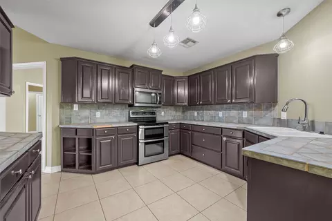 Kitchen - 10413 Granada Dr, Waco, TX 76708 photo 2 of 4