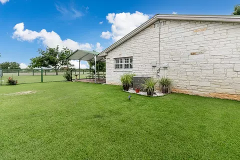 Exterior - 307 E Loop Dr, Brady, TX 76825 photo 3 of 11