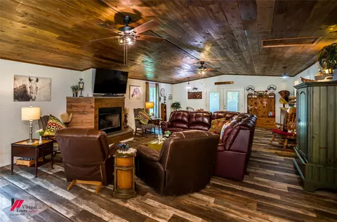 Living - 125 Honeysuckle Dr, Converse, LA 71419 photo 3 of 4