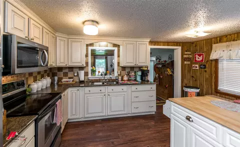 Kitchen - 125 Honeysuckle Dr, Converse, LA 71419 photo 3 of 3
