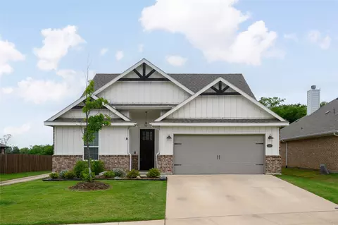 Exterior - 300 Bronco Dr, Pilot Point, TX 76258 photo 2 of 6