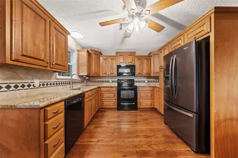 Kitchen - 443 Rost Rd, Mcgregor, TX 76657 photo 3 of 3