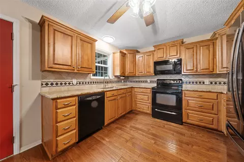 Kitchen - 443 Rost Rd, Mcgregor, TX 76657 photo 2 of 3