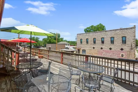 Exterior - 128 N Pecan St, Hico, TX 76457 photo 5 of 6