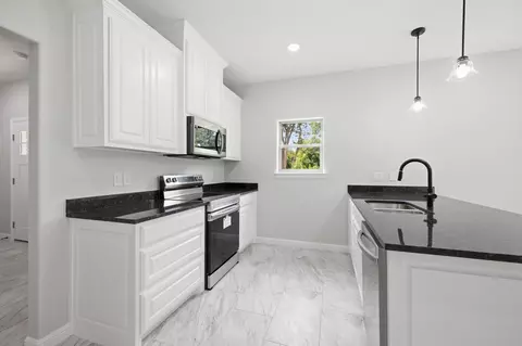 Kitchen - 302 Evans St, Cleburne, TX 76031 photo 2 of 3