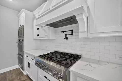 Kitchen - 560 Featherstone Ln, Prosper, TX 75078 photo 3 of 5