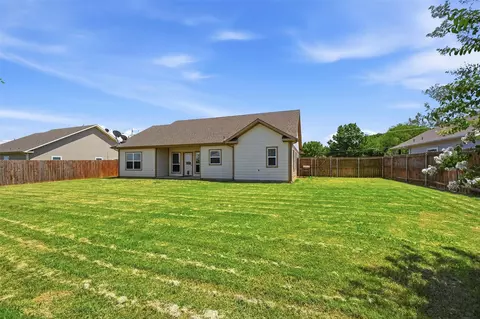 Exterior - 816 E Northside Dr, Pilot Point, TX 76258 photo 5 of 6