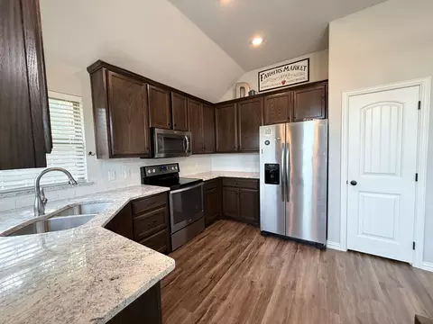 Kitchen - 618 E Walcott St, Pilot Point, TX 76258 photo 3 of 3