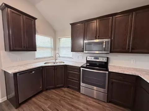 Kitchen - 618 E Walcott St, Pilot Point, TX 76258 photo 2 of 3