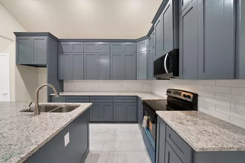 Kitchen - 407 E Willingham St, Cleburne, TX 76031 photo 3 of 5