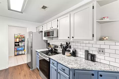 Kitchen - 1115 E 6th St, Springtown, TX 76082 photo 2 of 6