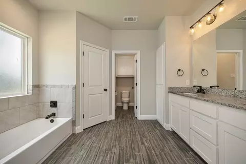 Bath - 917 E 3rd St, Springtown, TX 76082 photo 3 of 7