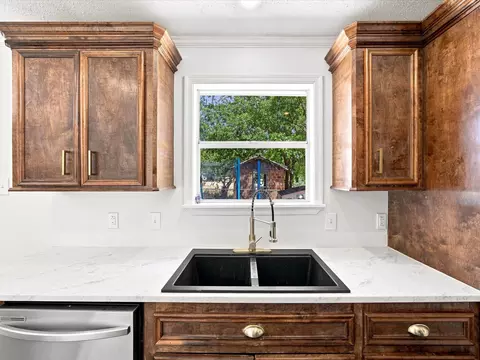 Kitchen - 321 E Pine St, Jacksboro, TX 76458 photo 2 of 3
