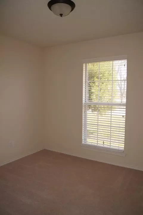 Bedroom - 8317 Spinnaker Cv, Rowlett, TX 75089 photo 1 of 3