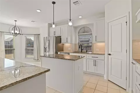 Kitchen - 1611 Mcmaster Ln, Prosper, TX 75078 photo 2 of 3