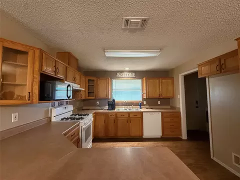 Kitchen - 601 Highway 588, Comanche, TX 76442 photo 3 of 6