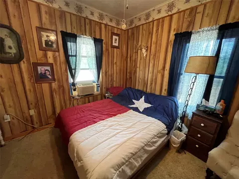 Bedroom - 541 E 3rd St, Baird, TX 79504 photo 2 of 4