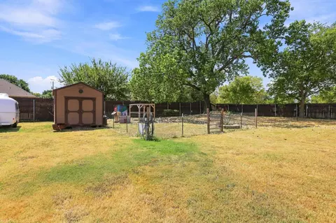 Exterior - 603 E Burks St, Pilot Point, TX 76258 photo 6 of 12
