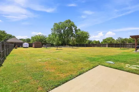 Exterior - 603 E Burks St, Pilot Point, TX 76258 photo 7 of 12