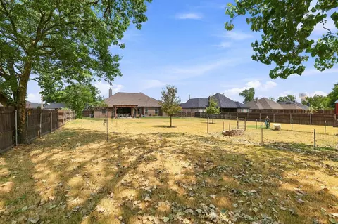 Exterior - 603 E Burks St, Pilot Point, TX 76258 photo 8 of 12