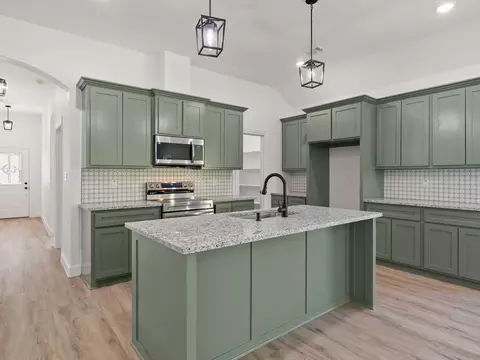 Kitchen - 101 N Oak St, Ector, TX 75439 photo 3 of 4