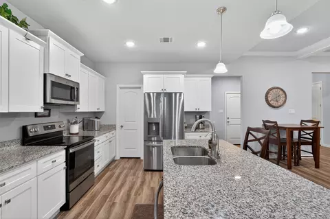 Kitchen - 108 Mcanear St, Cleburne, TX 76033 photo 2 of 4