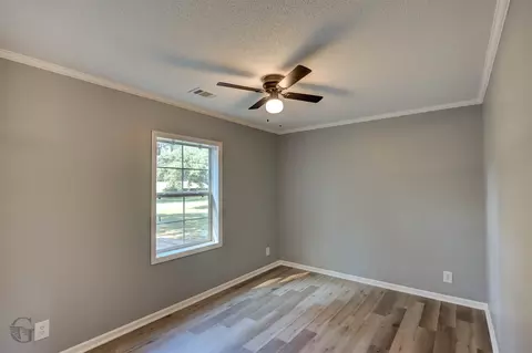 Bedroom - 818 E Palmetto Ave, Plain Dealing, LA 71064 photo 4 of 5