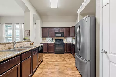 Kitchen - 507 S Navajo Trl, Mcgregor, TX 76657 photo 1 of 2