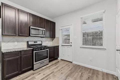Kitchen - 23658 Buttress Root Dr, Spring, TX 77373 photo 2 of 2