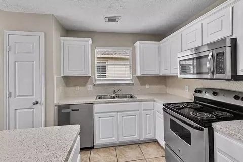 Kitchen - 4914 Comal River Loop, Spring, TX 77386 photo 2 of 2