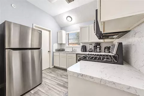 Kitchen - 23207 Lone Wolf Trl, Spring, TX 77373 photo 4 of 6