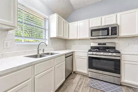 Kitchen - 23207 Lone Wolf Trl, Spring, TX 77373 photo 6 of 6