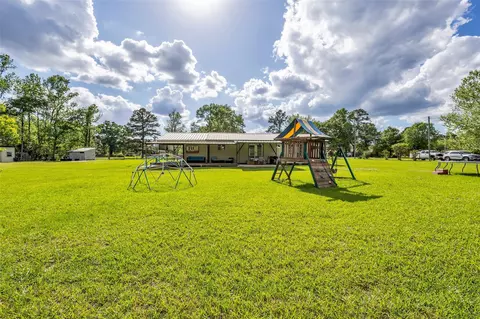 Exterior - 7476 S Fork Dr, Conroe, TX 77303 photo 11 of 17