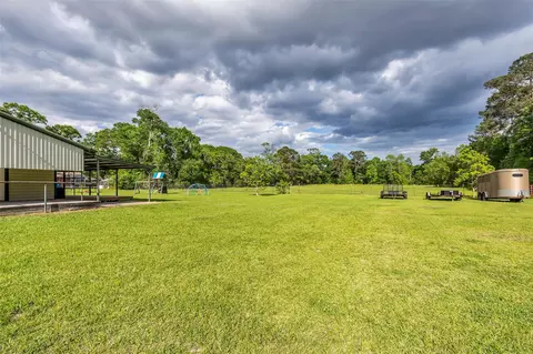 Exterior - 7476 S Fork Dr, Conroe, TX 77303 photo 12 of 17