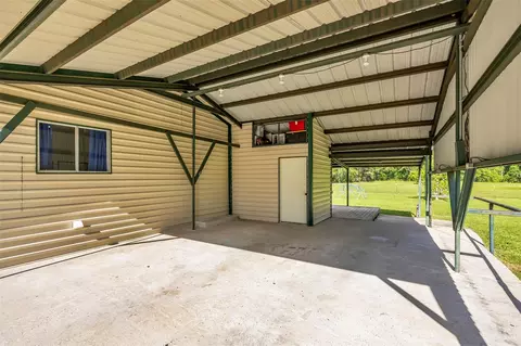 Exterior - 7476 S Fork Dr, Conroe, TX 77303 photo 16 of 17