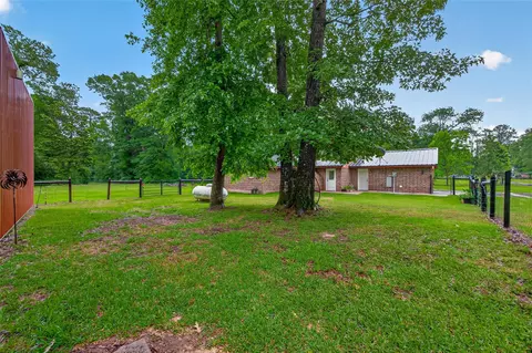 Exterior - 2181 Stringtown Rd, Shepherd, TX 77371 photo 7 of 20