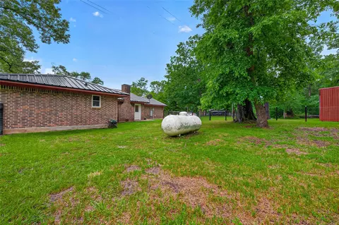 Exterior - 2181 Stringtown Rd, Shepherd, TX 77371 photo 8 of 20