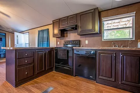 Kitchen - 210 Rain Forest Rd, Onalaska, TX 77360 photo 2 of 2