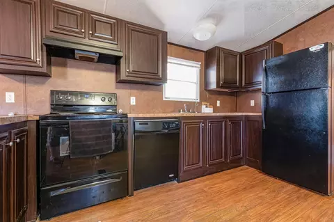 Kitchen - 210 Rain Forest Rd, Onalaska, TX 77360 photo 1 of 2