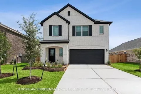 Exterior - 673 Falling Cave Dr, Willis, TX 77378 photo 2 of 3