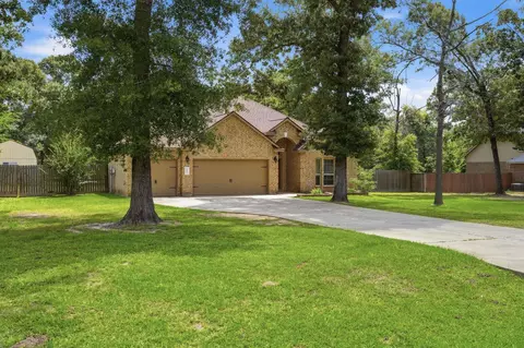 Exterior - 9217 Silver Back Trl, Conroe, TX 77303 photo 2 of 14