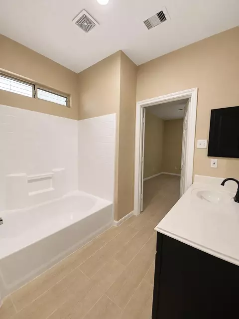Bath - 215 Doncaster St, Conroe, TX 77303 photo 1 of 7