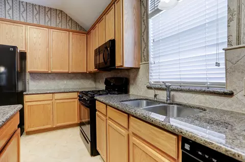 Kitchen - 21330 Timber Pines Dr, Spring, TX 77388 photo 4 of 4