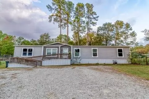 7715 Walnut Tree Ln, Plantersville, TX 77363