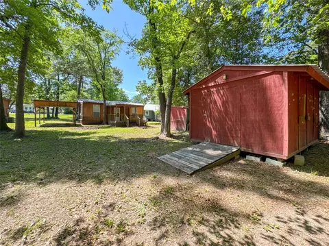 Exterior - 206 Tallow St, Onalaska, TX 77360 photo 9 of 13