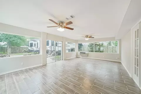 Living - 912 Brook Forest Dr, Conroe, TX 77385 photo 6 of 8