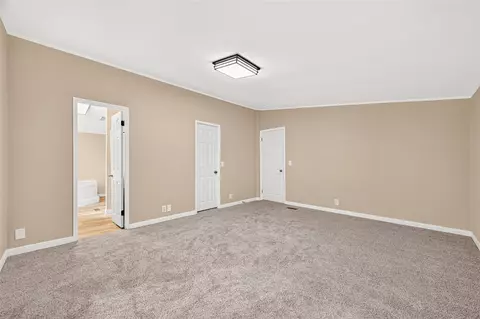 Bedroom - 16396 Red Tail Hawk Ct, Conroe, TX 77302 photo 2 of 6